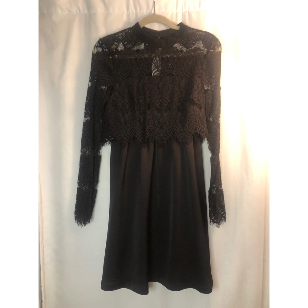 BCBG medium long sleeve black dress. Solid/lace